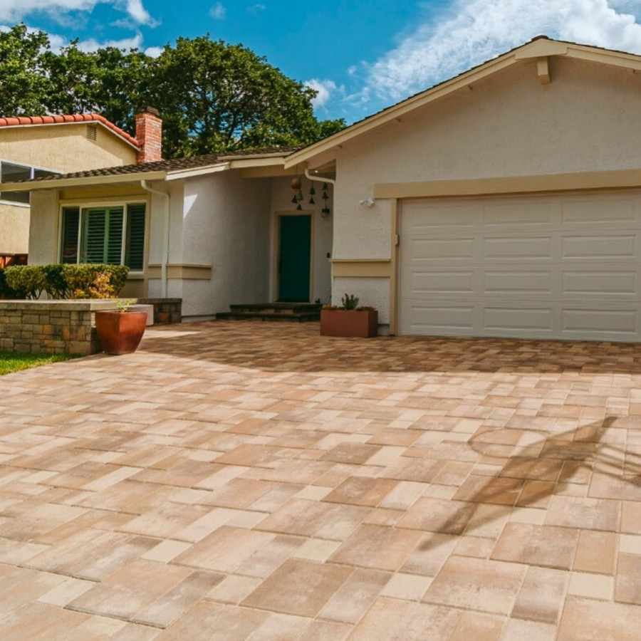 Paver driveway leading to a Bay Area garage