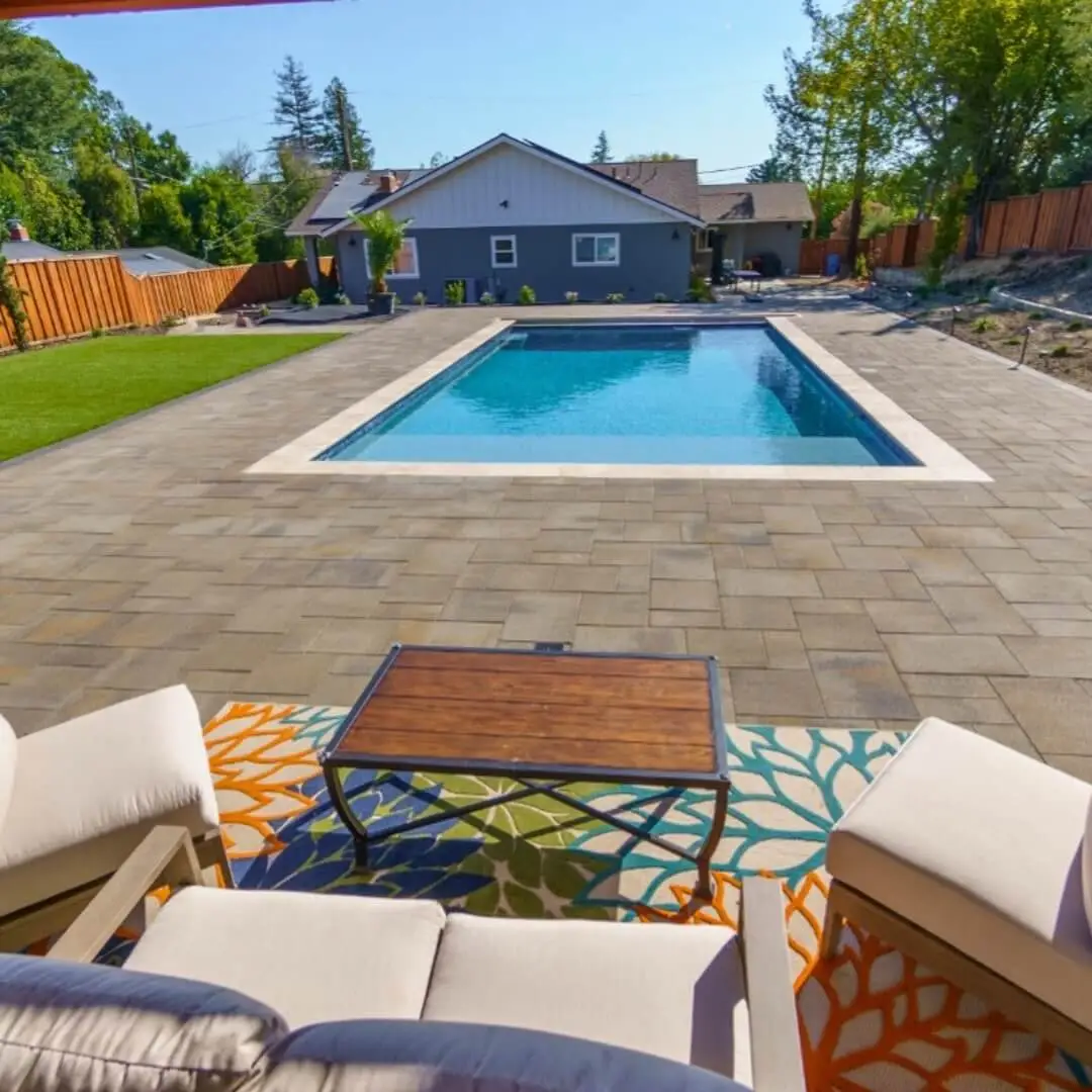 Architectural hardscape driveway and pool deck layout designed for safety and longevity Architectural hardscape driveway and pool deck layout designed for safety and longevity